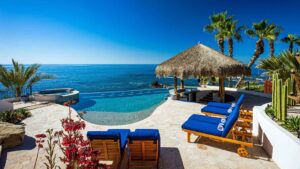 Luxury Los Cabos villa with infinity pool overlooking the Sea of Cortez at sunset
